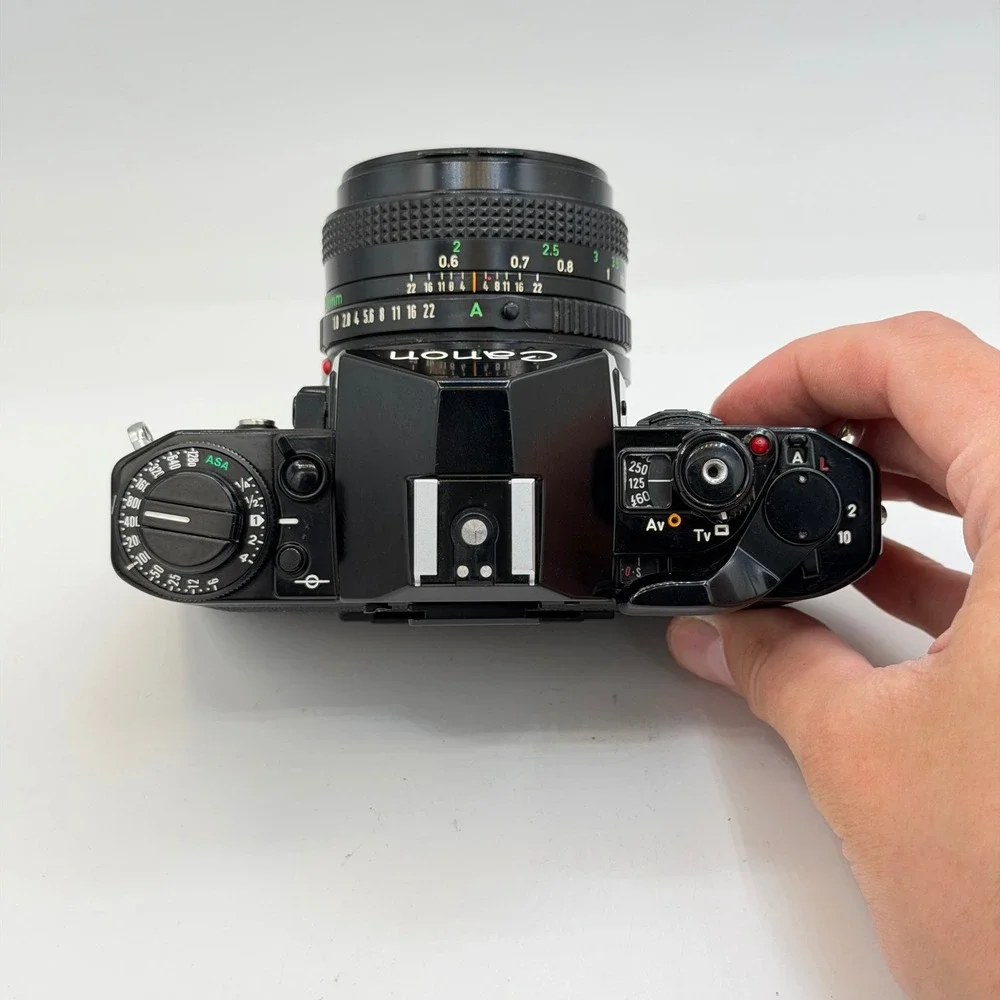 Canon A-1 35mm Film SLR Camera with FD 50mm 1:1.8 Lens, Filter, Cap Black TESTED